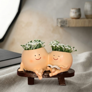 mother with kid smiley planter